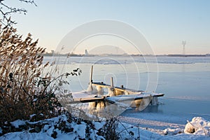 Frozen jetty along Veluwemeer in winter 2022-2021