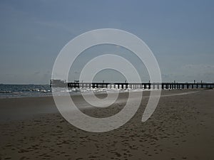 Jetty on sunset siluette photo at rayong province thailand