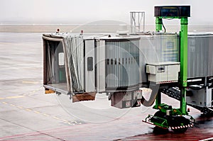 Jetway aerobridge parked in airport photo