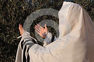 Pray prayerbook and blowing the shofar of Rosh Hashanah photo