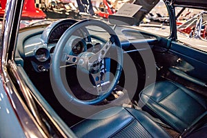 Jewel blue 1961 Chevrolet corvette convertible displayed at the Muscle Car City museum