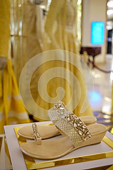 Jeweled Indian female bridal sandals in a luxury store in New Delhi, India