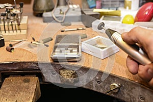 Jeweler`s workplace in a repair shop
