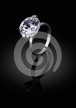 Jewelery ring with big diamond on black background, clipping pat