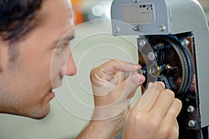 Jeweller making adjustments to ring