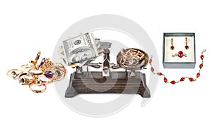 Jewelry, American dollars and scales isolated on a white . Collage