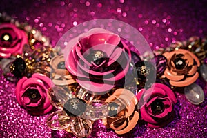 Jewelry background with luxury flowers on pink glitter