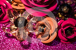 Jewelry background with luxury flowers on pink glitter