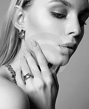 Jewelry on beautiful girl. Black and white Beauty Fashion Portrait