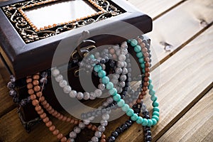 Jewelry box full of beads, treasure chest