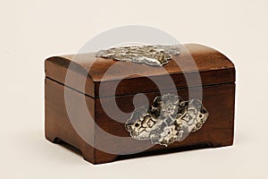 Jewelry box made of wood with additional workmanship and decorated. photo