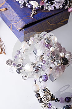 Jewelry bracelet with semiprecious and crystal at white background