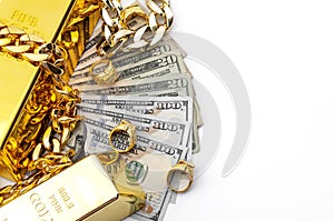 Jewelry buyer, pawn shop and buy and sell precious metals concept theme with a pile of cash in US dollars, golden rings, necklace photo