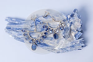 Jewelry earrings with kyanite or distin mineral from Brazil. Blue aluminosilicate mineral with columnar crystals and metamorphic