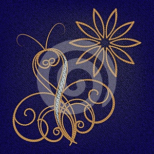 Jewelry gold butterfly with diamonds. Textured swirls butterfly and flower on denim jeans background. Golden strings. Swirl lines