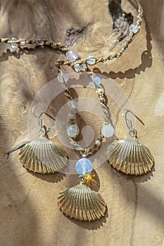 Jewelry; jewellery; shell; shape; metal; brass; gold; golden; plated; necklace; earrings; set; collection; handmade; design; art;