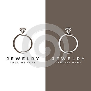 Jewelry ring abstract logo template design with luxury diamonds or gems.Isolated on black and white background.Logo can be for