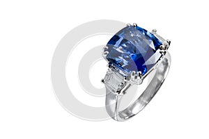 Jewelry ring with big blue sapphir on white background. photo