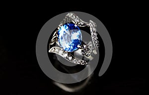 jewelry ring witht big blue sapphir. photo