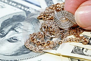 Jewelry scrap of gold and silver and money, pawnshop concept