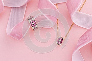 Jewelry set of pave ring and pendant necklace with pink and white gemstones