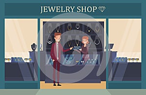 Jewelry shop showcase with man choosing ring