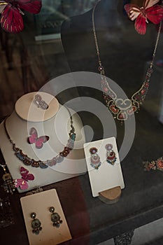 Jewelry store shop small business. Vintage jewelry store window display showcase. Antique collection of a jewellery