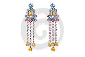 Jewelry on a white background. Women`s earrings premium with precious stones. Isolate Jewelry. Briliant.