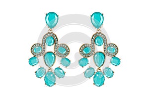 Jewelry on a white background. Women`s earrings premium with precious stones. Isolate Jewelry. Briliant.