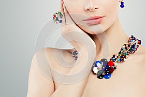 Jewelry woman. Colorful necklace, ring and earrings portrait