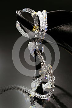 Jewels around a fashion black shoe heel