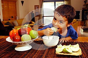 Jewish boy eats Apple in Honey