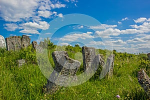 Jewish cemetery stone graves in Jerusalem ancient religion Israeli national heritage place bright colorful summer time clear