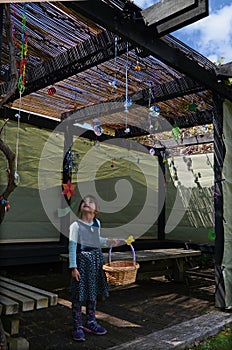 Jewish child decorating the family Sukkah photo