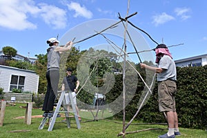 Jewish Family Building a Sukkah on Sukkoth Feast of Tabernacles Jewish Holiday photo