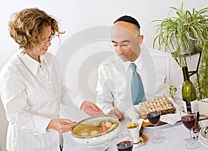 Jewish family celebrating passover