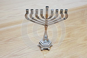 Jewish festive Hanukkiah on the table