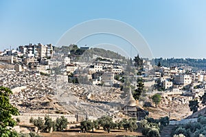 Jewish graveyard with the Tomb of Absalom at the Kidron Valley or King`s Velley between Temple Mount and Mount of Olives in