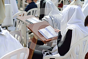 Jewish hasidic pray a the Western Wall, Wailing Wall the Place of Weeping is an ancient limestone wall in the Old City of Jerusale