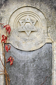 Jewish Headstone flowers stone symbol embem background cemetery old granit marble font letters