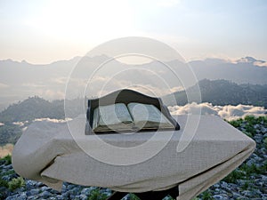 Jewish holiday background with old book and landscape concept photo