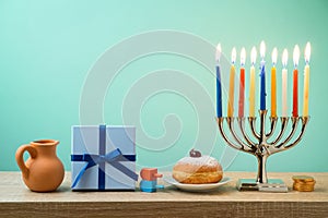 Jewish holiday Hanukkah background with menorah, sufganiyot, gif