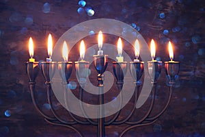 jewish holiday Hanukkah background with menorah & x28;traditional candelabra& x29; and burning candles