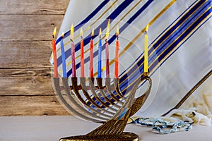 Jewish holiday Hanukkah creative background with menorah. View from above focus on .