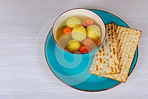 Jewish Holiday kosher food served on passover matzah ball soup in a pot photo