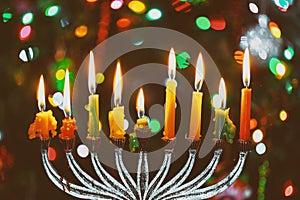 Brightly Glowing Hanukkah Menorah soft focus photo