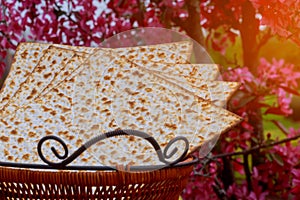 Jewish holiday passover matzot with seder on plate on table close up