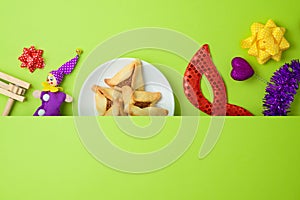 Jewish holiday Purim background with carnival mask and hamantaschen cookies