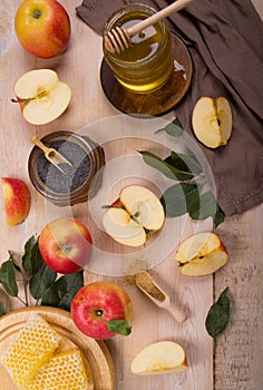 Jewish holiday Rosh Hashana background with apples and honey on blackboard. View from above. Flat lay