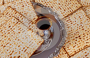 Jewish house meticulously prepare for Passover festivities with red kosher wine a unleavened bread matzo